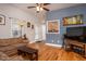 Inviting living room with hardwood floors, ample natural light, and a cozy atmosphere at 305 Freeman St, Raleigh, NC 27601