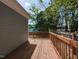 Deck area with wooden railing overlooking the fenced-in backyard at 314 Gray Ave, Durham, NC 27701