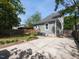 Backyard features a concrete patio, garden area, and a wood fence at 314 Gray Ave, Durham, NC 27701