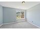 Bedroom with carpet and a window showing the outdoors at 3604 Rivermist Dr, Raleigh, NC 27610
