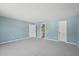 Spacious bedroom with carpet and multiple points of access at 3604 Rivermist Dr, Raleigh, NC 27610
