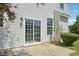 Exterior patio with a sliding glass door and vinyl siding at 3604 Rivermist Dr, Raleigh, NC 27610