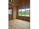 Framed bedroom with a view of the outside through three large windows at 3608 Cobbler Vw Way, Fuquay Varina, NC 27526