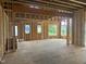 Interior view of the living room during framing showing views to the outdoors at 3608 Cobbler Vw Way, Fuquay Varina, NC 27526