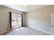 Comfortable bedroom with natural light and neutral decor at 395 Carolina Landing Dr, Zebulon, NC 27597