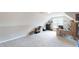 Bonus room featuring a desk space, carpet flooring and a window at 395 Carolina Landing Dr, Zebulon, NC 27597