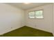 Modest bedroom with window and carpeted floors at 4170 Buckhorn Rd, Sanford, NC 27330