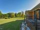 Charming brick home with iron railing, a decorative weather vane, and an expansive front yard at 4170 Buckhorn Rd, Sanford, NC 27330