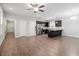 Open floor plan with hardwood floors offers seamless transition between the living and dining areas at 419 E East Hinton St, Clayton, NC 27520