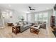 Spacious living room with hardwood floors, comfortable seating, and abundant natural light at 4412 Powell Grove Ct, Raleigh, NC 27606