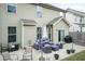 Spacious back patio features stylish outdoor furniture, perfect for entertaining or relaxing outdoors at 45 Davelyn Ct, Garner, NC 27529