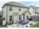 Exterior view of the home with a patio featuring outdoor furniture and a grill, perfect for enjoying the backyard at 45 Davelyn Ct, Garner, NC 27529