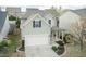 Charming home features a front-facing garage, covered porch, and manicured landscaping at 45 Davelyn Ct, Garner, NC 27529