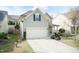 Beautiful two-story home with a well-maintained lawn and an attached two-car garage at 45 Davelyn Ct, Garner, NC 27529