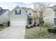Attractive home showcasing a well-kept lawn, inviting entrance, and blooming landscaping at 45 Davelyn Ct, Garner, NC 27529