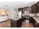 Well-equipped kitchen with stainless steel appliances, granite countertops, and ample cabinet space at 45 Davelyn Ct, Garner, NC 27529