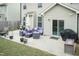 Outdoor patio featuring comfortable seating, a grill, and ample space for entertaining at 45 Davelyn Ct, Garner, NC 27529