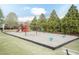 Community playground with swings, slides, and play structures, creating a fun and safe environment for  at 45 Davelyn Ct, Garner, NC 27529