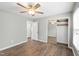 This is a view of the bedroom, showcasing the mirrored closet doors and wood flooring at 5000 Avenida Del Sol Dr, Raleigh, NC 27616