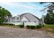 Attractive townhomes with gray siding, picket fences, and well-kept landscaping at 5000 Avenida Del Sol Dr, Raleigh, NC 27616