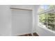 Bright walk-in closet with a window and wood flooring at 504 Cameron Glen Dr, Apex, NC 27502