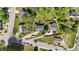 Aerial view of the home with a well-maintained lawn and surrounding greenery in a residential neighborhood at 508 2Nd Street St, Apex, NC 27502