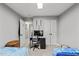 Shared bedroom featuring twin beds, neutral carpet, and natural lighting at 508 2Nd Street St, Apex, NC 27502