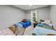 This bedroom features two cozy twin beds with brightly colored bedding at 508 2Nd Street St, Apex, NC 27502