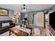 Comfortable living room featuring stylish decor, modern lighting and luxury vinyl flooring at 508 2Nd Street St, Apex, NC 27502