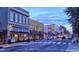 Street view with various shops and restaurants with a beautiful sunset at 508 2Nd Street St, Apex, NC 27502