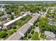 An aerial view features townhomes and surrounding trees at 511 N Person St # 101, Raleigh, NC 27604