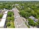 An aerial view showcases townhomes and street at 511 N Person St # 101, Raleigh, NC 27604