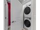 Efficient laundry area featuring a stacked washer and dryer set at 511 N Person St # 101, Raleigh, NC 27604