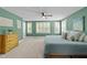 Spacious main bedroom featuring carpet, plenty of natural light, and an ensuite bathroom at 511 N Person St # 101, Raleigh, NC 27604