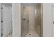 Walk in shower with tile and glass doors at 511 N Person St # 101, Raleigh, NC 27604