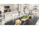 Inviting open living space combining the dining area, kitchen, and living room for easy socializing at 533 Freedom Trail Dr, Willow Springs, NC 27592