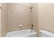 Bathroom features tiled shower and tub with coordinated fixtures at 5605 Cary Glen Blvd, Cary, NC 27519