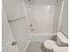 Bright bathroom features a tub-shower combination and modern fixtures at 62 Sailfish Ct, Clayton, NC 27520