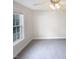 Bedroom showcasing ample light from the large window at 62 Sailfish Ct, Clayton, NC 27520