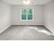 Bedroom filled with light from the window at 62 Sailfish Ct, Clayton, NC 27520