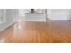 Dining and living area featuring hardwood floors and an open layout at 62 Sailfish Ct, Clayton, NC 27520