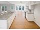 Bright, updated kitchen with an eat-in bar area and stainless steel appliances at 62 Sailfish Ct, Clayton, NC 27520