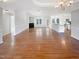 Bright, open-concept living space features a fireplace and hardwood floors at 62 Sailfish Ct, Clayton, NC 27520