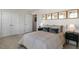 Cozy bedroom featuring neutral decor, double closets, and a view to the hallway at 714 Andrade Dr, Fuquay Varina, NC 27526
