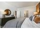 Serene primary bedroom features elegant decor and a view of the ensuite bathroom and walk-in closet at 714 Andrade Dr, Fuquay Varina, NC 27526