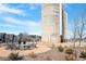 Outdoor community space with charcoal grills, picnic tables and seating near three silos at 717 Silo Park Dr, Wake Forest, NC 27587