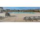 Community pool area with loungers and tables, ideal for summer relaxation at 717 Silo Park Dr, Wake Forest, NC 27587