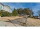 Entrance to community trail, landscaped and well maintained with natural surroundings at 717 Silo Park Dr, Wake Forest, NC 27587