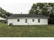 Backyard with a well-maintained lawn and the back of the house at 732 Westview Ct, Nashville, NC 27856