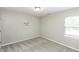 Bedroom with neutral walls, carpet, one window, and ceiling light at 732 Westview Ct, Nashville, NC 27856